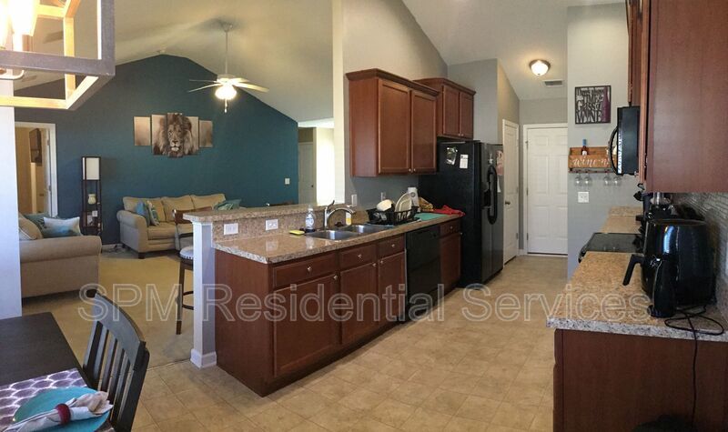 Fenced in backyard, Community Pool, and Tennis court property image