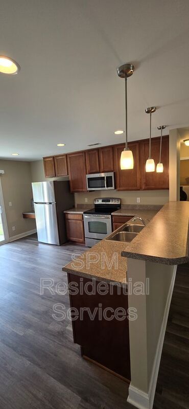 Fenced in backyard, LVP throughout, Covered front porch property image