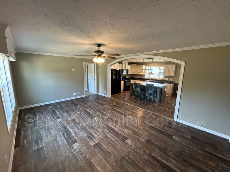 Large fenced backyard, Community Pool, and Kitchen Island property image