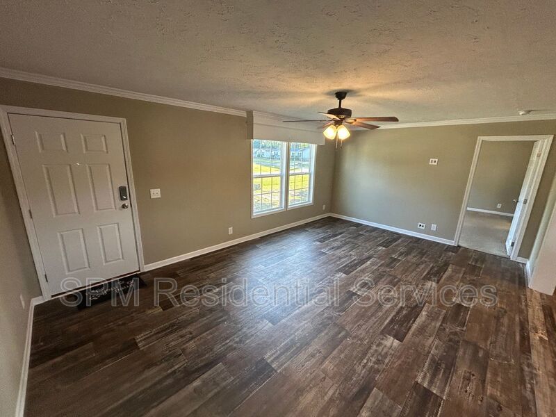 Large fenced backyard, Community Pool, and Kitchen Island property image