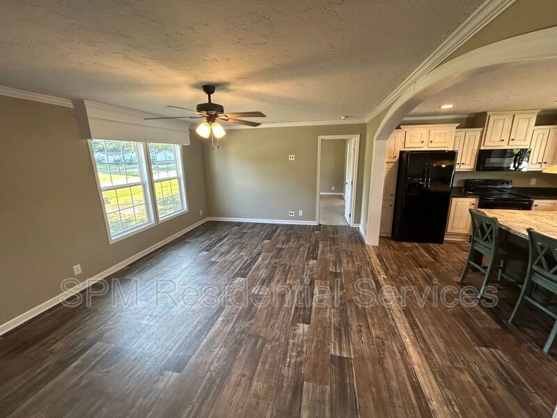 Large fenced backyard, Community Pool, and Kitchen Island property image