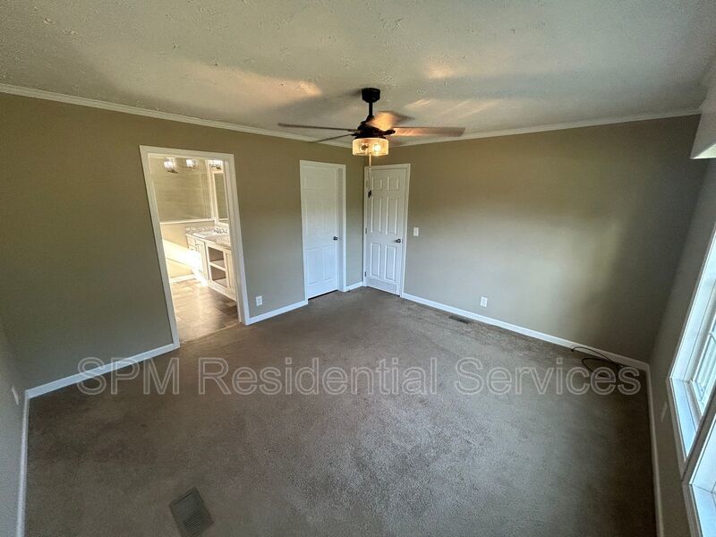 Large fenced backyard, Community Pool, and Kitchen Island property image