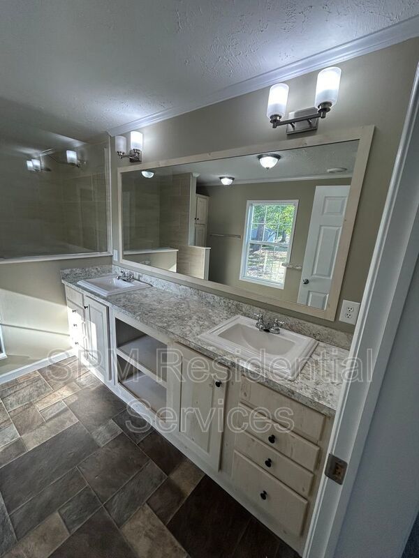 Large fenced backyard, Community Pool, and Kitchen Island property image