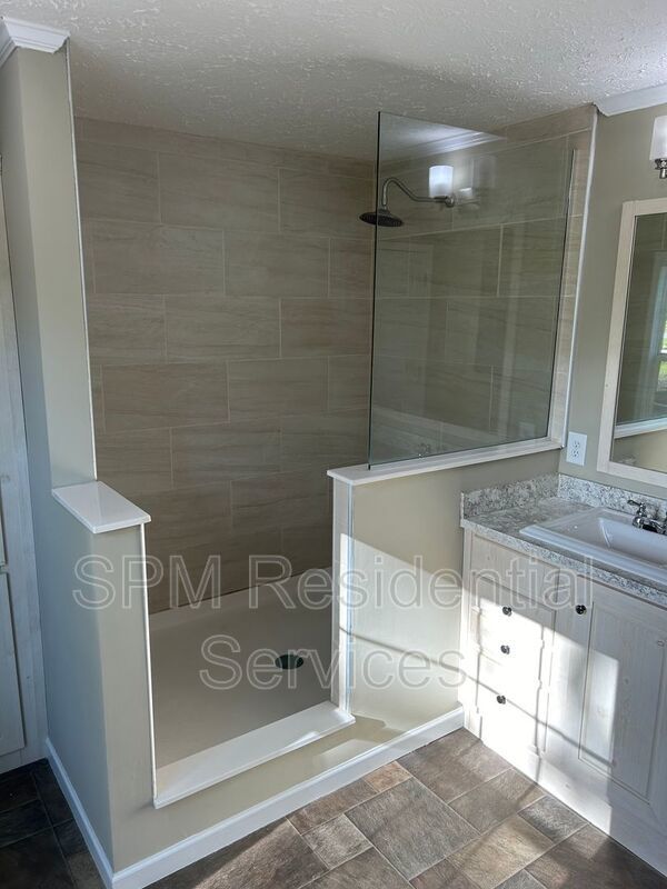 Large fenced backyard, Community Pool, and Kitchen Island property image