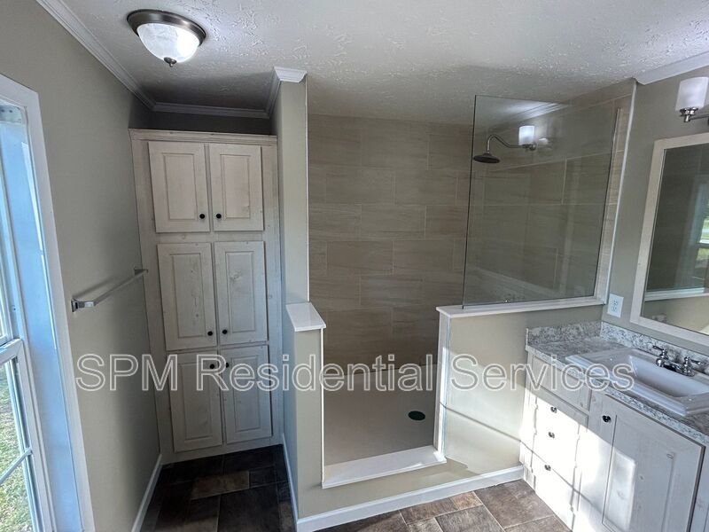 Large fenced backyard, Community Pool, and Kitchen Island property image