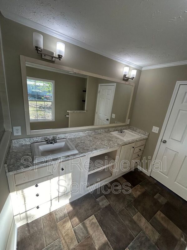 Large fenced backyard, Community Pool, and Kitchen Island property image