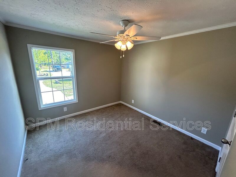 Large fenced backyard, Community Pool, and Kitchen Island property image