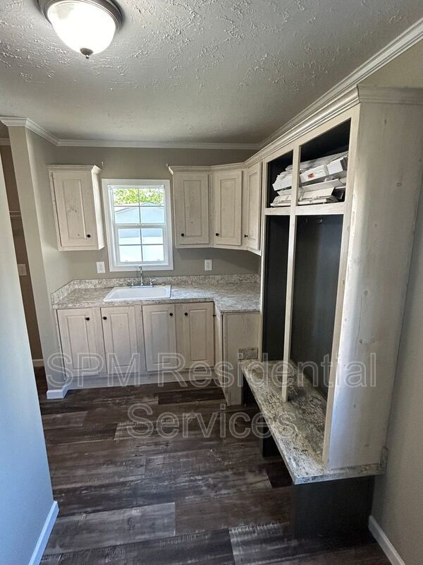 Large fenced backyard, Community Pool, and Kitchen Island property image