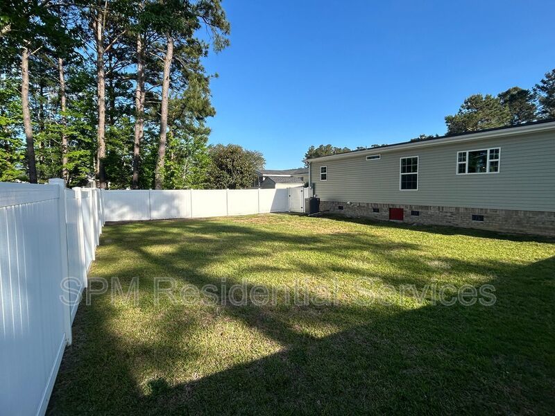 Large fenced backyard, Community Pool, and Kitchen Island property image