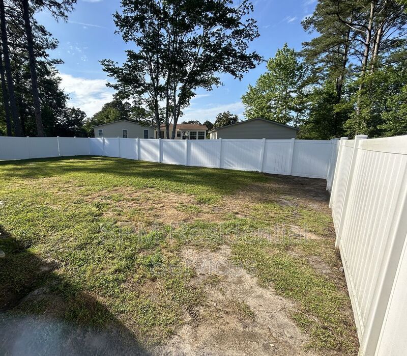 Large fenced backyard, Community Pool, and Kitchen Island property image