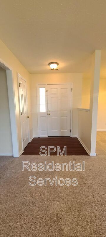 Fenced in backyard, Trash included, large primary bedroom. property image