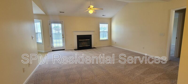 Fenced in backyard, Trash included, large primary bedroom. property image