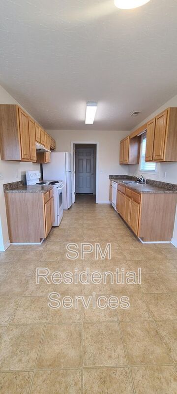 Fenced in backyard, Trash included, large primary bedroom. property image