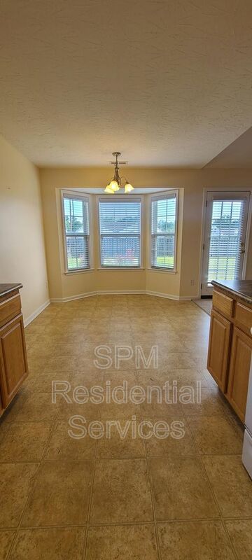 Fenced in backyard, Trash included, large primary bedroom. property image