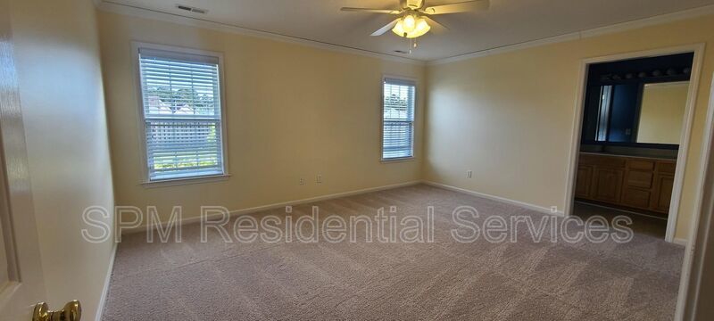 Fenced in backyard, Trash included, large primary bedroom. property image