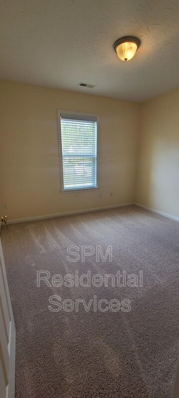 Fenced in backyard, Trash included, large primary bedroom. property image