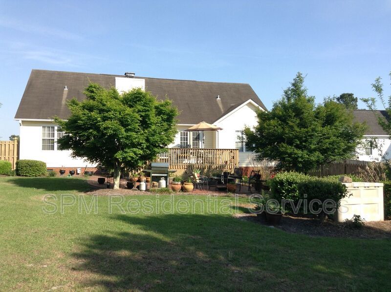 Fenced in backyard, Lawncare included property image