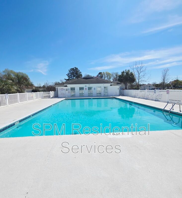 Large fenced backyard, Community Pool, and Kitchen Island property image