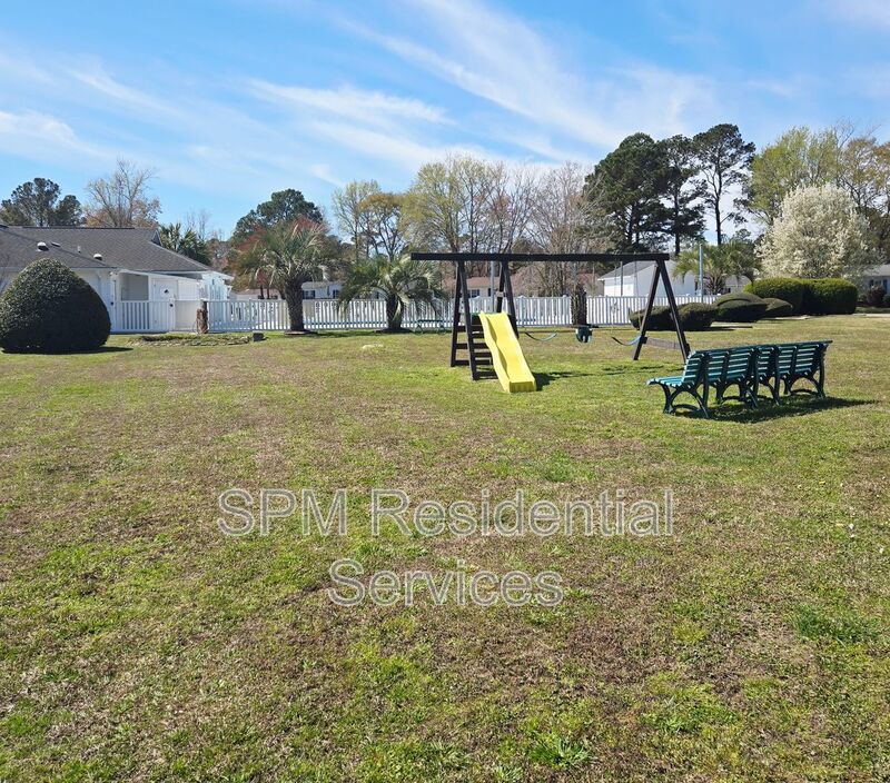 Large fenced backyard, Community Pool, and Kitchen Island property image
